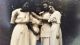 Photographic postcard: 4 young women in white, Circa 1900